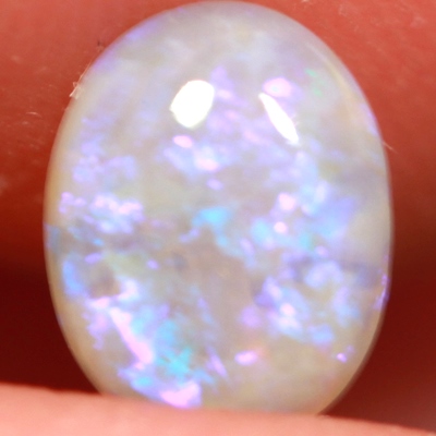 SOLID CRYSTAL OPAL Pretty purple throughout
